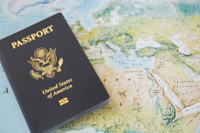 U.S. Passport and the world map.